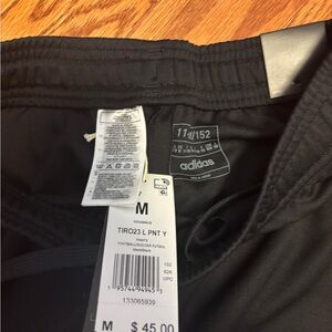 BNWT Adidas trio 23 pants in size M (11/12)